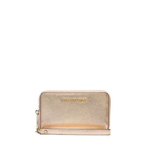 michael kors jet set travel large metallic leather smartphone wristlet|Jet Set Travel Large Metallic Leather Smartphone Wristlet.